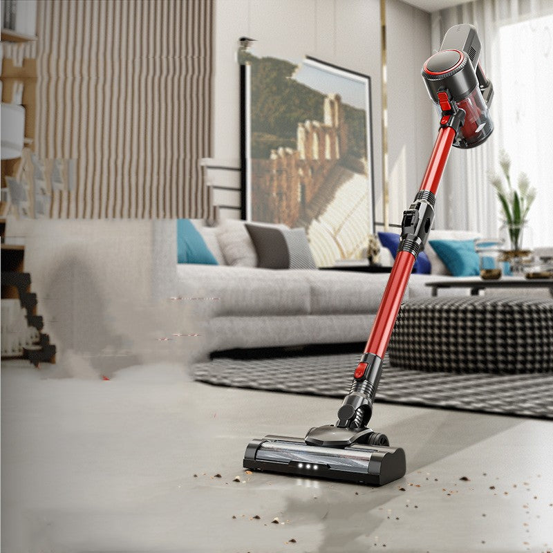 Black and red stick vacuum with floor head in a living room